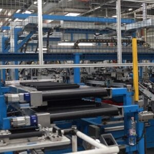 image of a worker in an auto parts factory symbolizing IATF regulations
