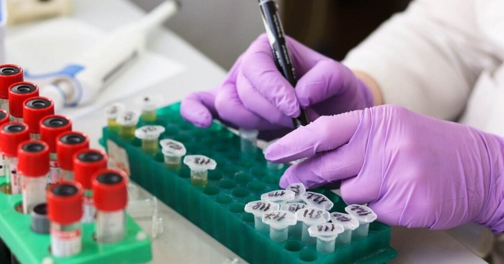 Image of a laboratory personnel conducting tests symbolizing laboratory management
